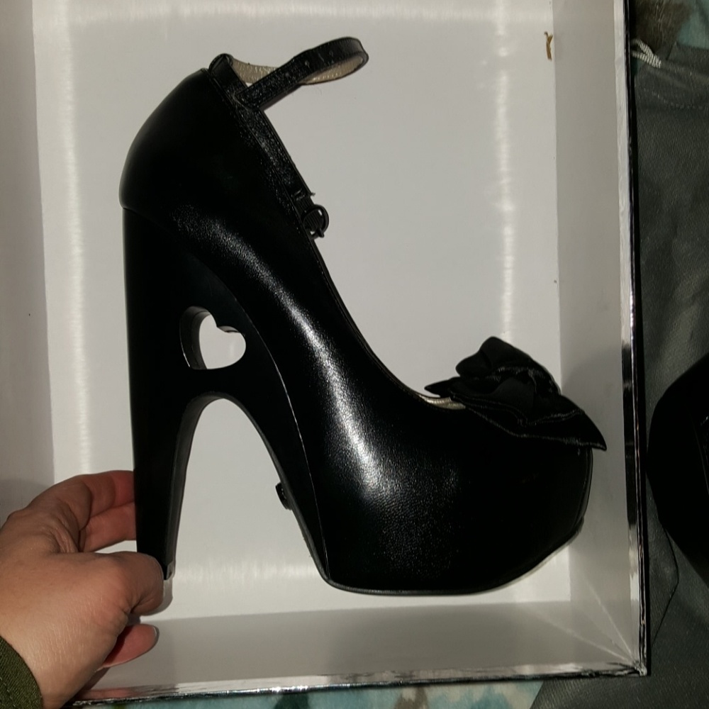 TUK 9 black super high heart cut out platforms bow